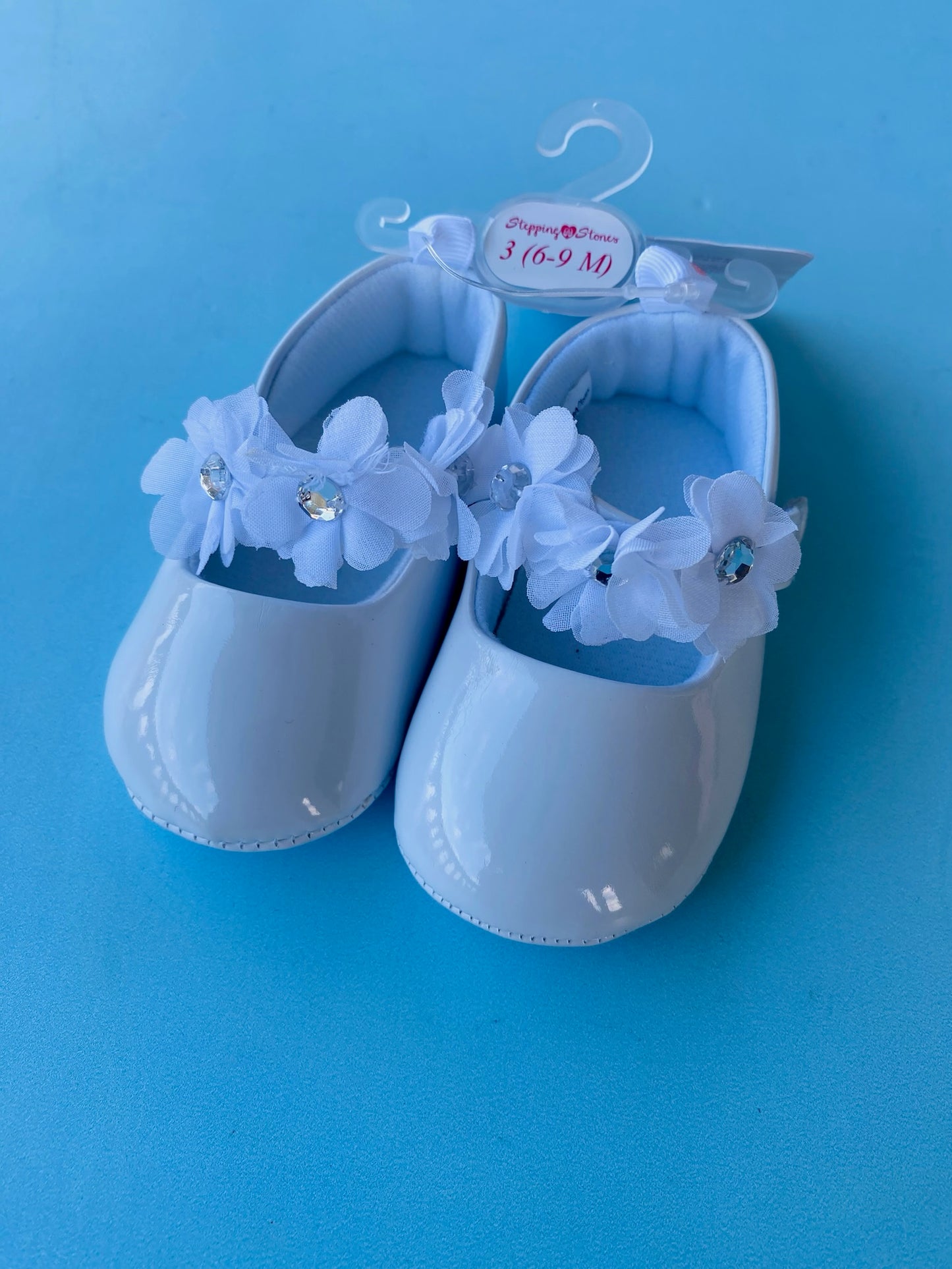 ZAPATOS NIÑA FLORES BLANCO