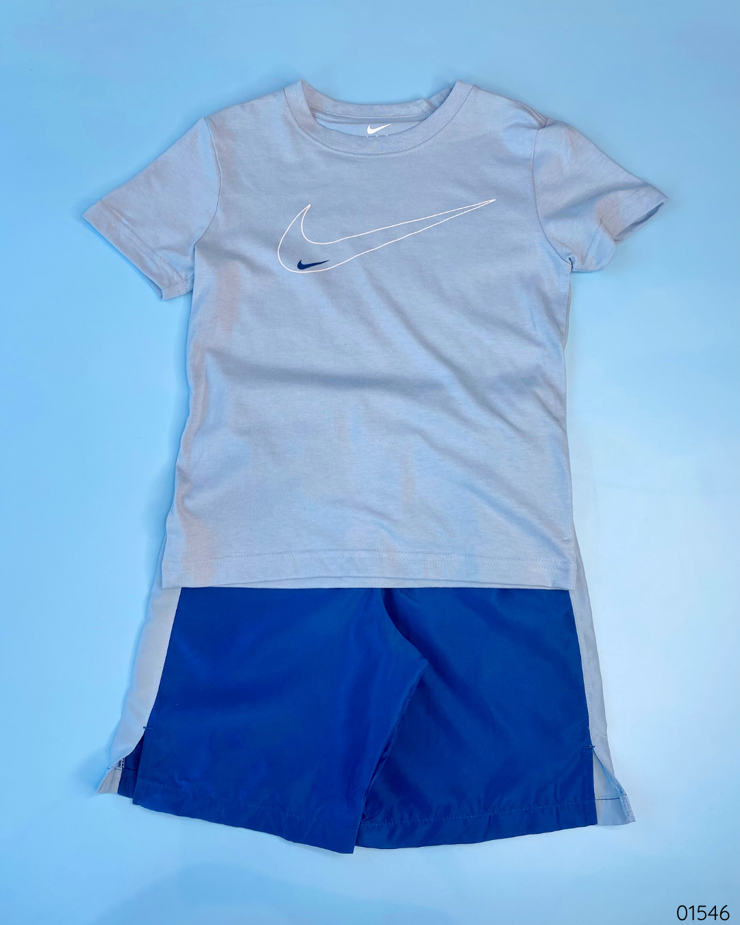 TRAJE 2 PZS NIKE GRIS SHORT AZUL
