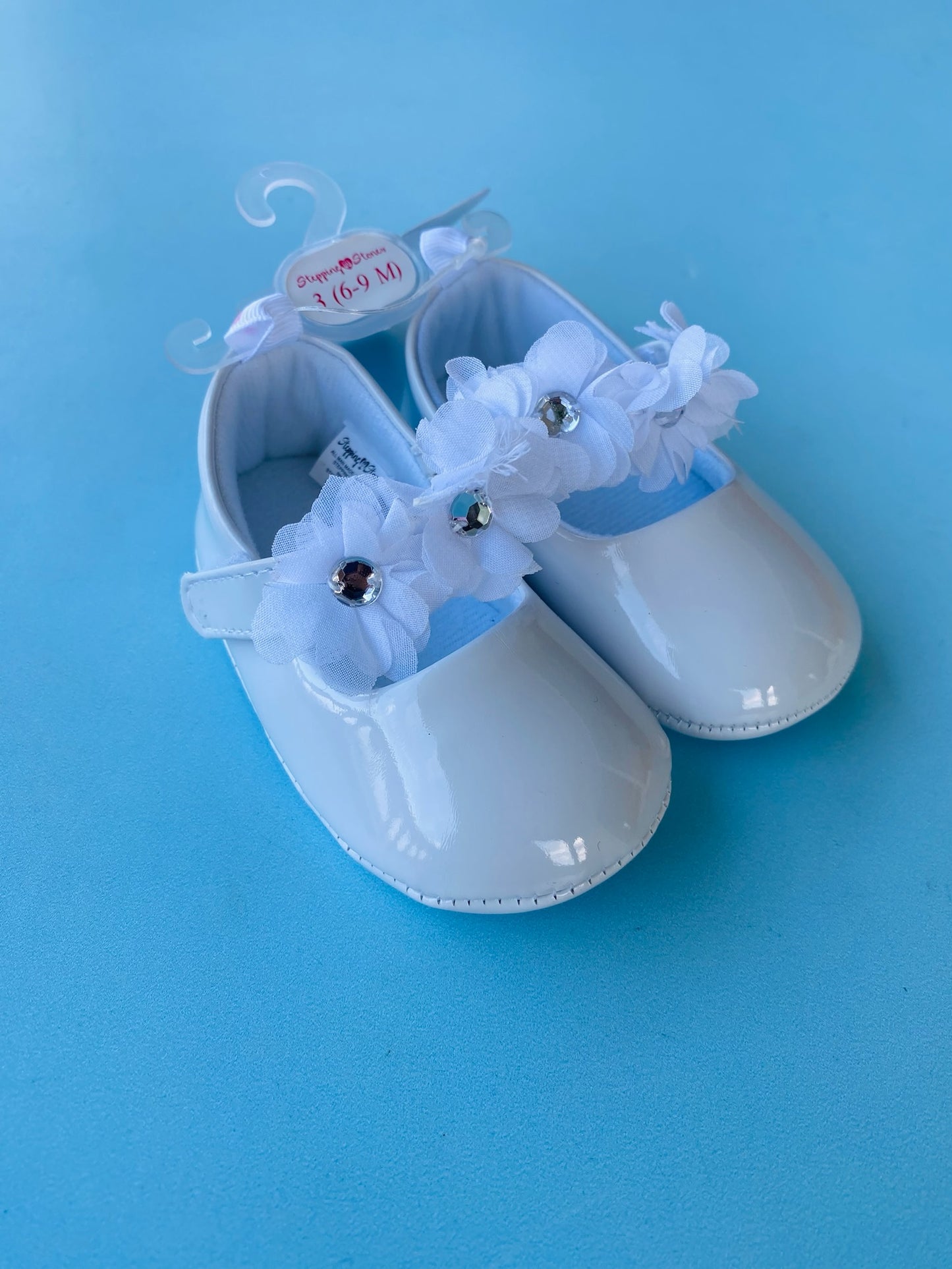 ZAPATOS NIÑA FLORES BLANCO