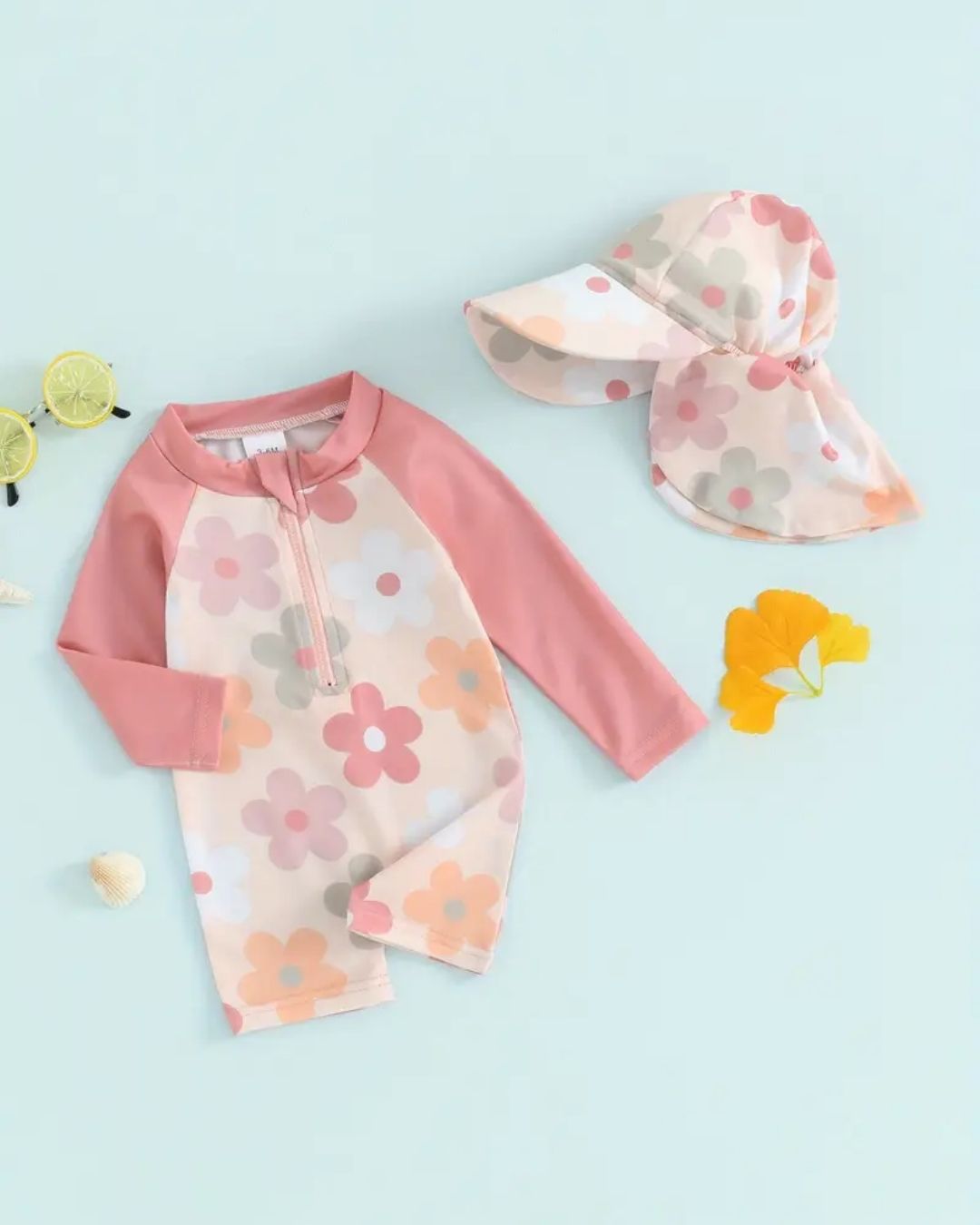 TRAJE DE BAÑO FLORES ROSADO C/GORRO