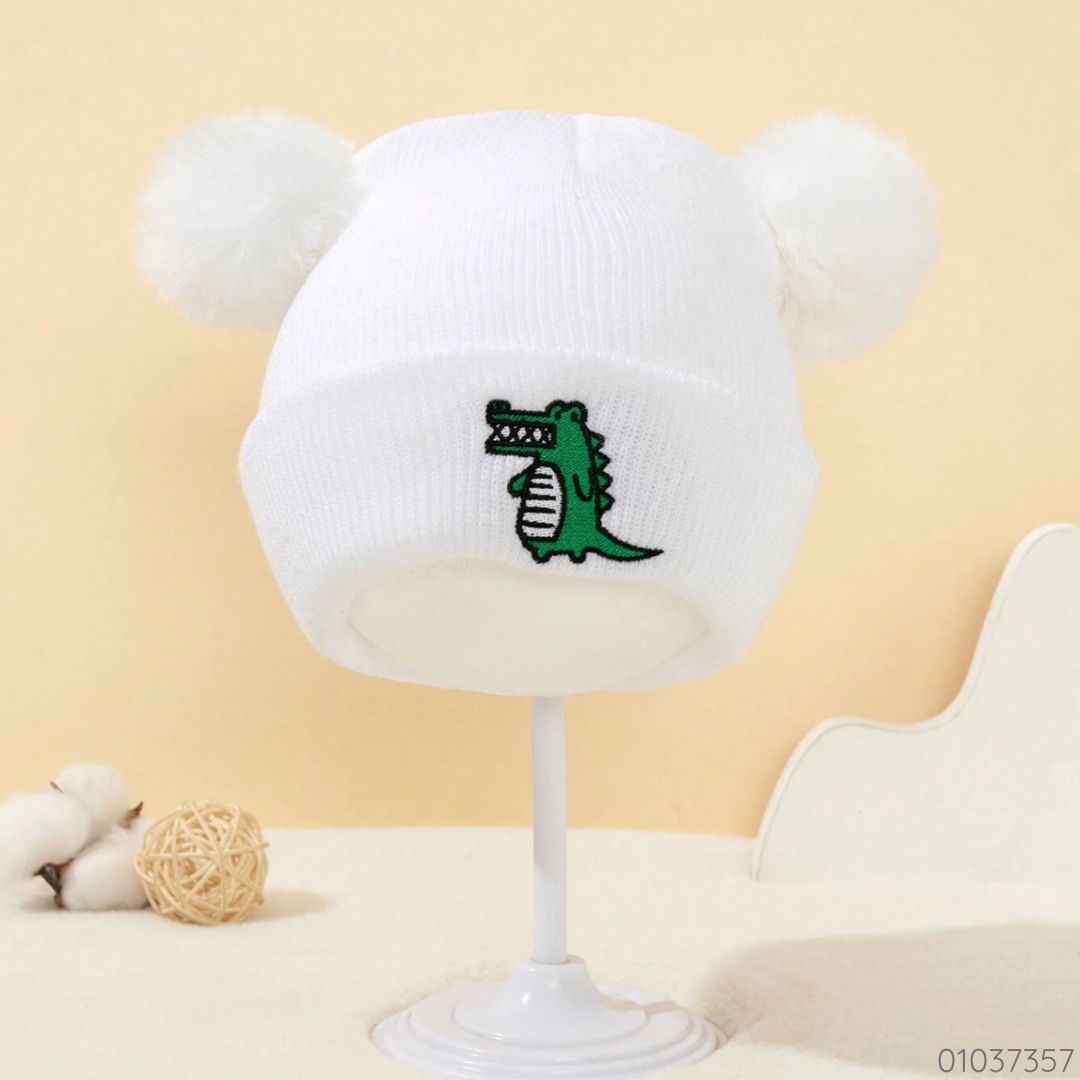 GORRO BLANCO DINO VERDE POMPON