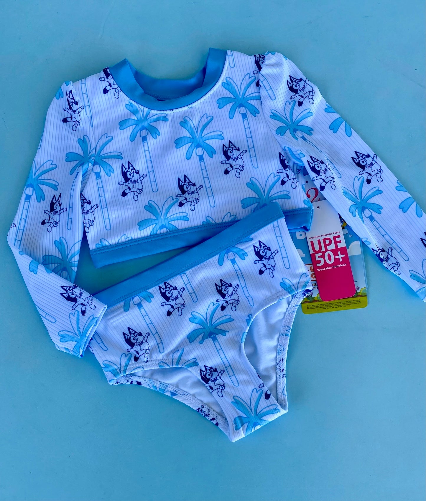 TRAJE DE BAÑO 2PZ BLUEY BLANCO AZUL NIÑA
