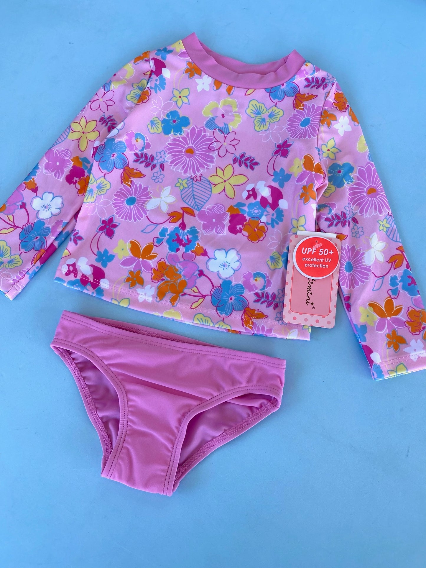 TRAJE DE BAÑO 2PZS FLOREADO ROSADO NIÑA