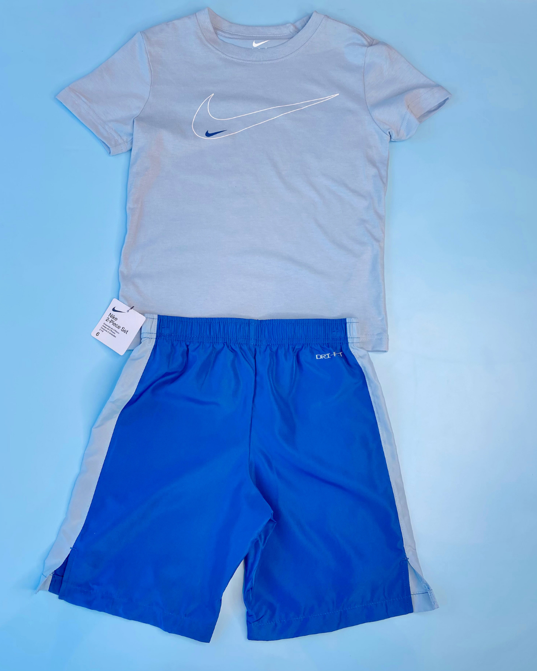 TRAJE 2 PZS NIKE GRIS SHORT AZUL
