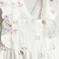 TRAJE FLORES H&M