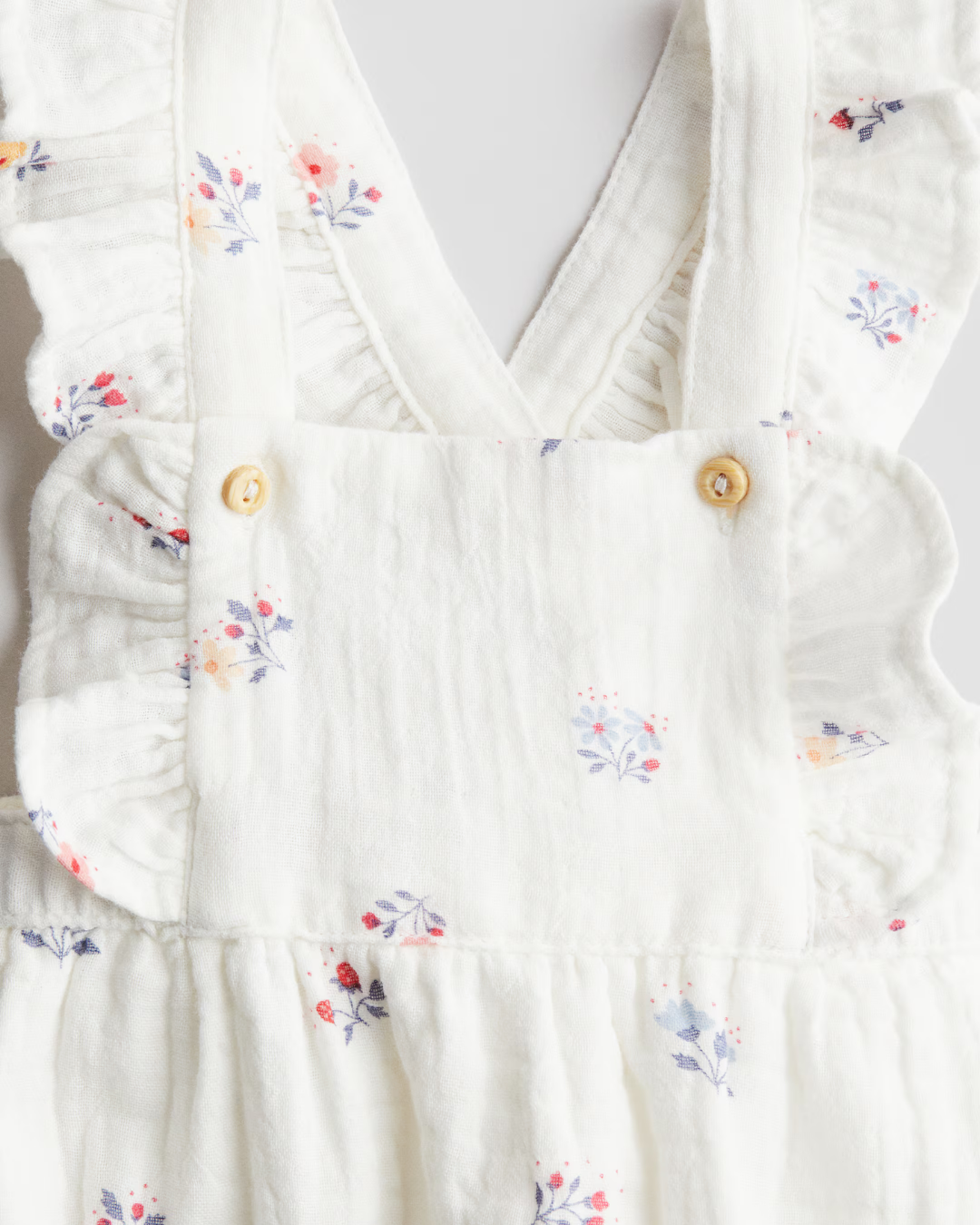 TRAJE FLORES H&M