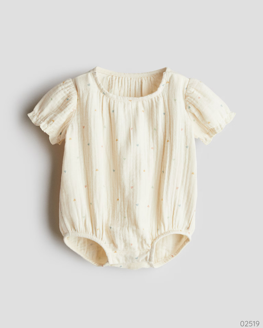 ROMPER CORAZONES BEIGE H&M