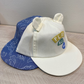 GORRA CON OREJITAS DINOS