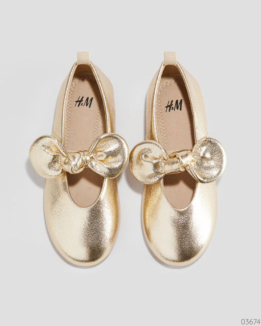 ZAPATO DORADO BRILLANTE CHONGO H & M