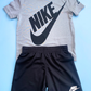 TRAJE 2 PZS NIKE GRIS SHORT NEGRO